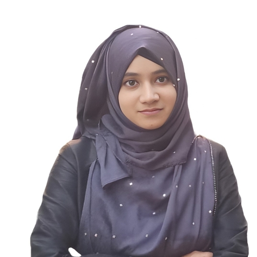 Portrait of Sumaia Aktar - woman with a pleasant smile with kind eyes; wearing a dark purple headscarf.